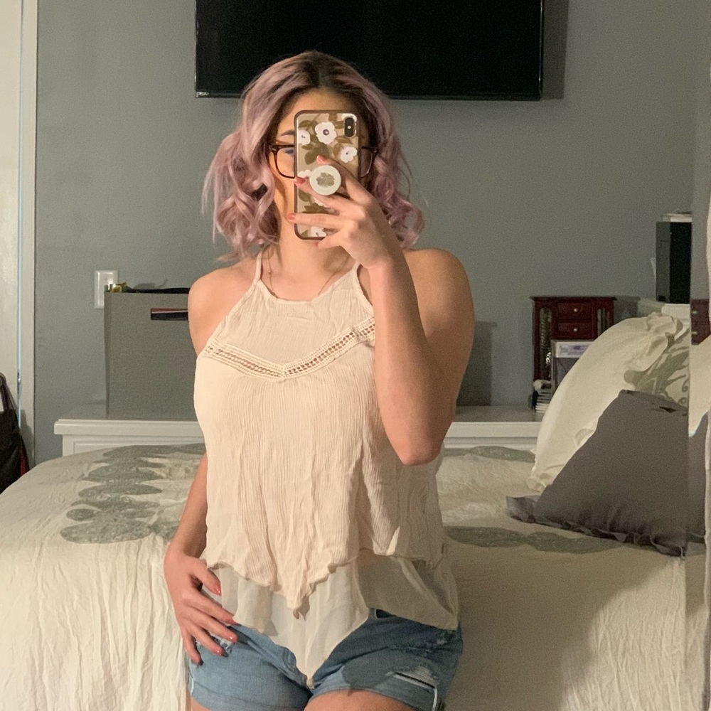 Woman’s off white blouse
